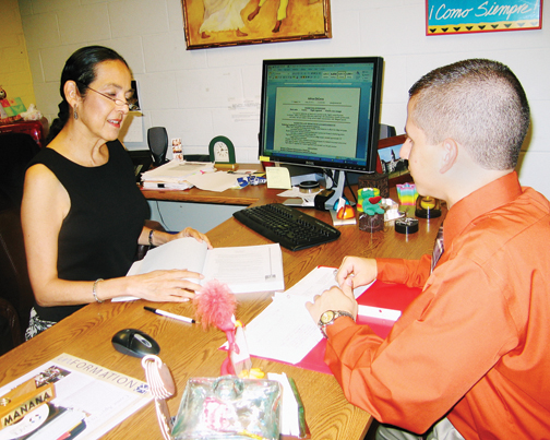 Emily Salazar, career counselor, with Adrian DeLeon, a junior.
