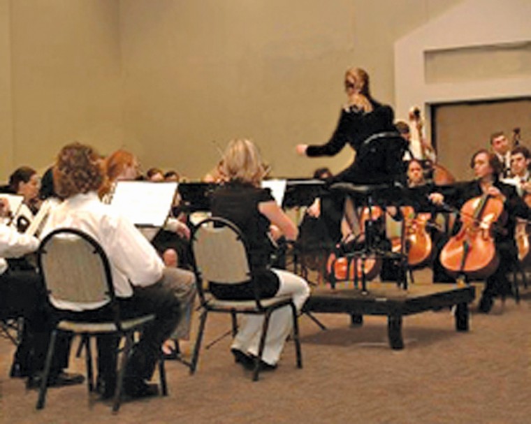 The St. Edward's University orchestra during rehearsal.
