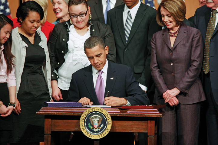 Promising decreased costs, President Obama signed sweeping health care legislation into law.
