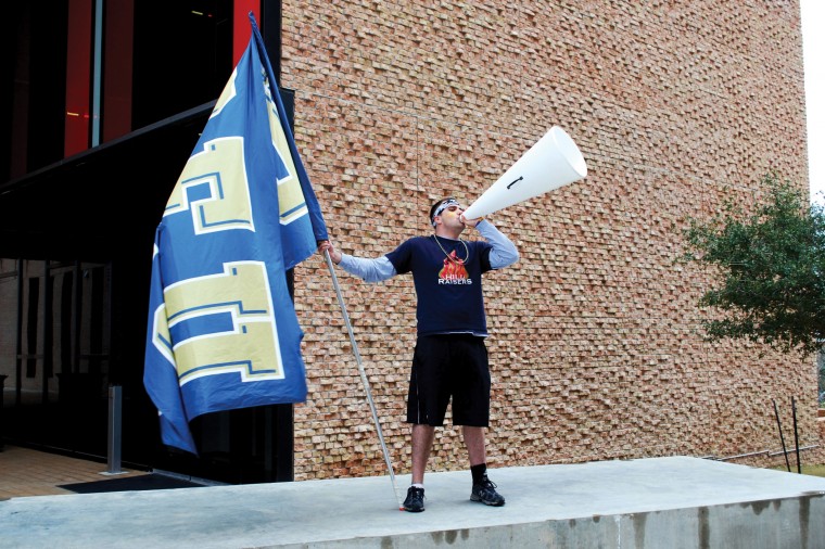 Mason Simmons leads pre-game parade across campus last semester to promote school spirit
