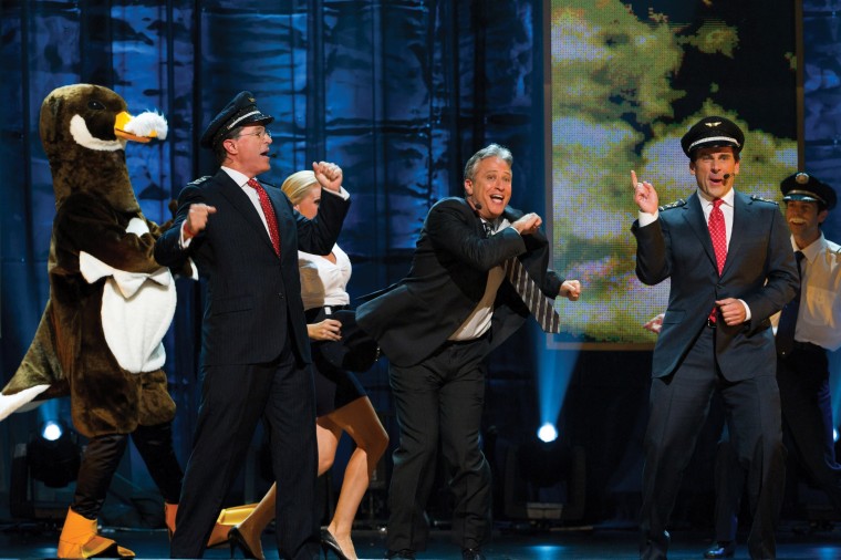 Colbert and Stewart perfom at a charity event.
