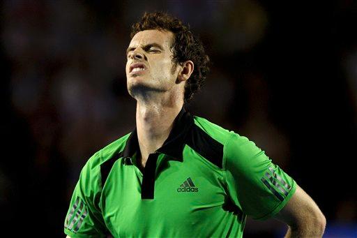 Britains Andy Murray reacts during his loss to Serbias Novak Djokovic in the mens singles final at the Australian Open tennis championships in Melbourne, Australia, Sunday, Jan. 30, 2011.
