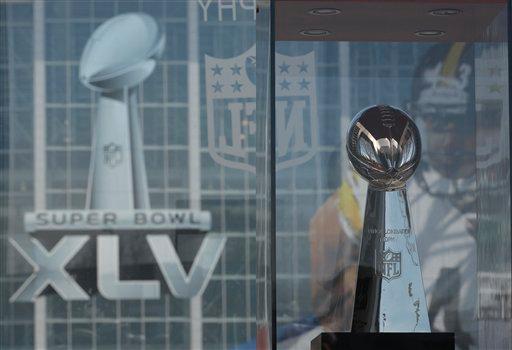 The Vince Lombardi Trophy sits outside Cowboys Stadium before the NFL football Super Bowl XLV game between the Green Bay Packers and the Pittsburgh Steelers Sunday, Feb. 6, 2011, in Arlington, Texas.
