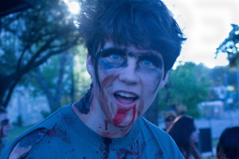 Participants in the Zombie Walk were covered in blood as they staggered around Austin.
