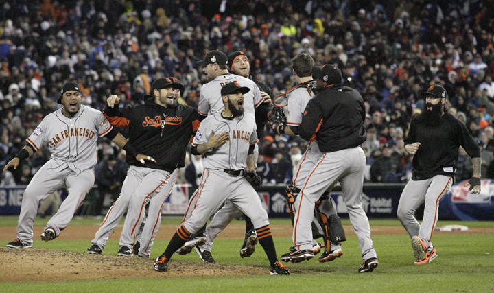 The San Francisco Giants celebrate defeating the Detroit Tigers in the 10th inning of Game 4 of the 2012 World Series at Comerica Park in Detroit, Michigan, Sunday, October 28, 2012. The Giants defeated the Tigers, 4-3, and swept the series 4-0. (Gary Reyes/San Jose Mercury News/MCT)
