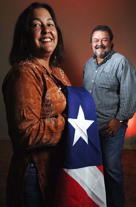 Puerto Rican natives Sonia Vizcarrondo-Rizarry and her husband Rafi Escudero-Miranda of Wellington, Florida, are on different sides of the Puerto Rico statehood debate, July 3, 2007. Sonia prefers commonwealth and Rafi prefers statehood.
