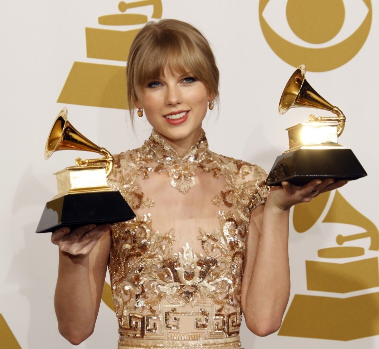 Taylor Swift with her awards at the 54th Annual Grammy Awards at the Staples Center in Los Angeles, California, on Sunday, February 12, 2012. (Allen J. Schaben/Los Angeles Times/MCT)
