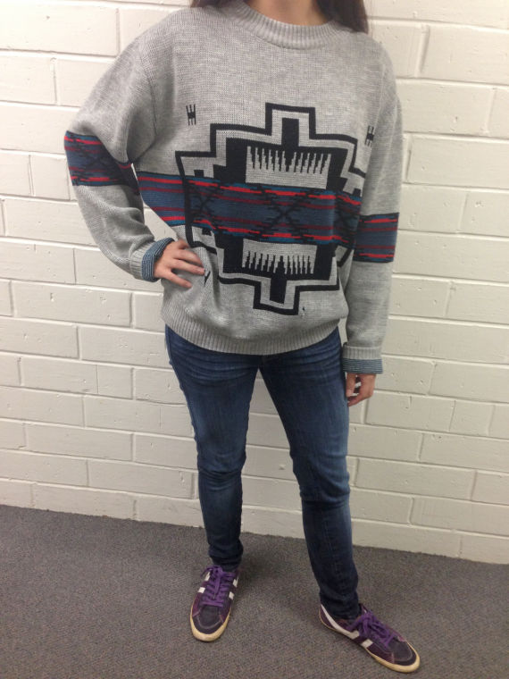Oversized sweaters are one aspect of the '90s grunge trend.
