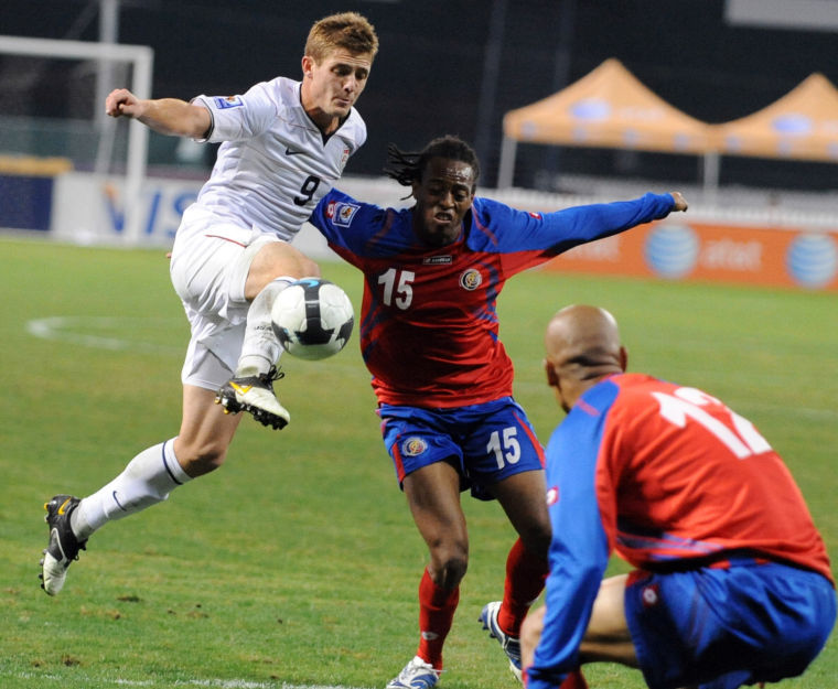 USA midfielder Robbie Rogers (9) elevates to get a past off against Costa Rica defender Junior Diaz (15) during the second half a FIFA World Cup Qualifier match at RFK Stadium in Washington, D.C., Wednesday, October 14, 2009. The USA and Costa Rica tied, 2-2. (Chuck Myers/MCT)
