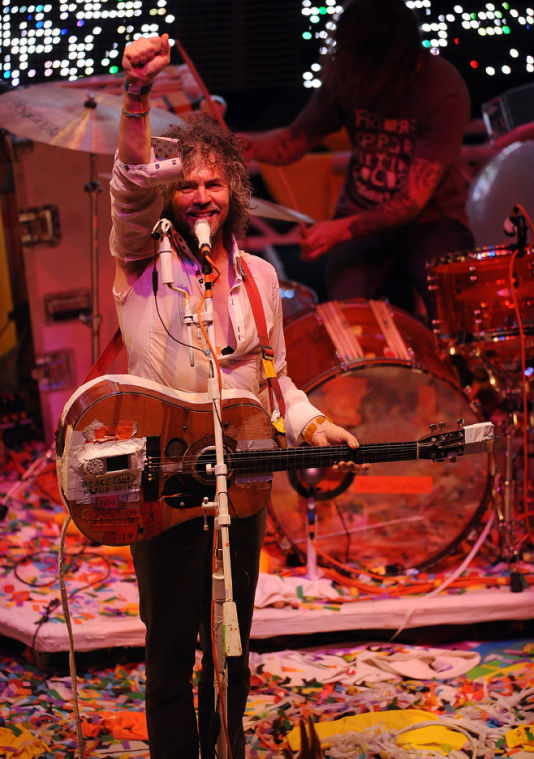 The Flaming Lips frontman Wayne Coyne and drummer Steven Drozd, back, perform during a concert at The National in Richmond, Virginia, Sunday, May 15, 2011. (Chuck Myers/MCT)
