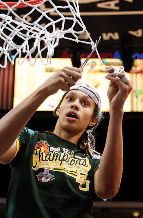 Baylor Bears center Brittney Griner (42) cuts off a piece of net after the teamês 75-47 win over Iowa State in the womens Big 12 Championship game in Dallas, Texas, Monday, March 11, 2013. (Richard W. Rodriguez/Fort Worth Star-Telegram/MCT)

