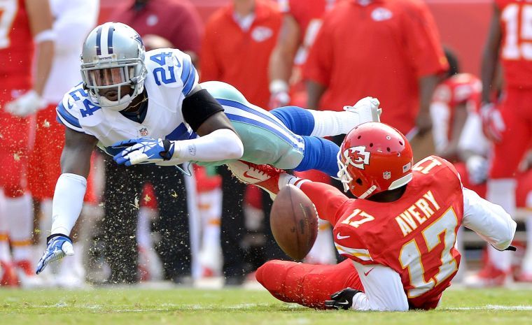 Dallas Cowboys cornerback Morris Claiborne (24) picks up a defensive-pass interference penalty, while covering Kansas City Chiefs wide receiver Donnie Avery (17).