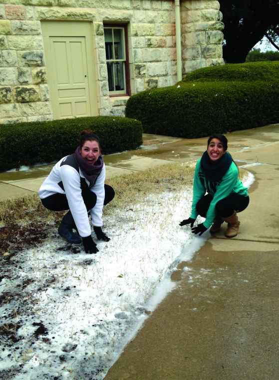 Students played in a patch of snow when class was cancelled.