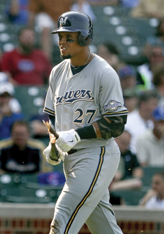 Carlos Gomez admires near homerun ball, leading to brawl.