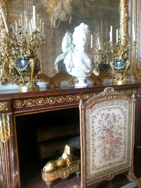 The fireplace in Marie Antoinettes bedroom features a statue of Marie herself. Vanity? Or just plain awesomeness?
