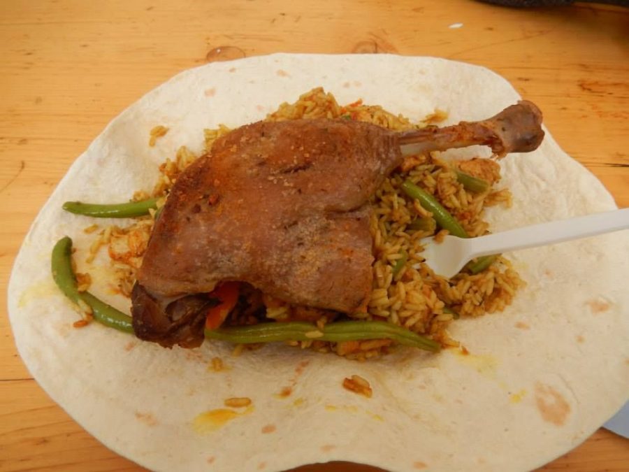 This is the first meal I had in Budapest. It is a salted goose leg on curry rice with green beans and served on a tortilla-like bread.