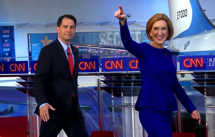 Former HP CEO Carly Fiorina, right, won the debate, according to a new Hilltop Views poll. Wisconsin Gov. Scott Walker walked out of the presidential race on Monday. 