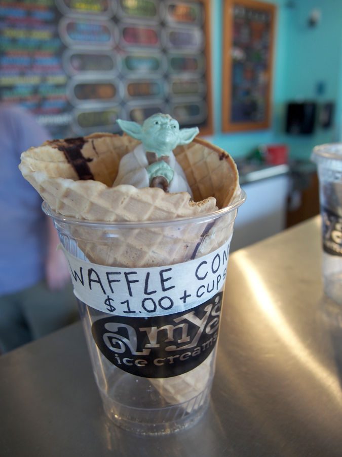 Yoda idly waits for the last scoop of ice cream to be served at Amy’s Ice Creams across the street from St. Edward’s.