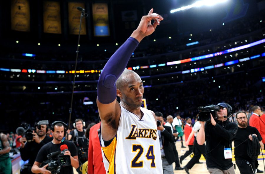 The Los Angeles Lakers' Kobe Bryant waves to the crowd as he leaves the court following a 107-100 loss against the Boston Celtics at Staples Center in Los Angeles on Sunday, April 3, 2016. (Wally Skalij/Los Angeles Times/TNS)
