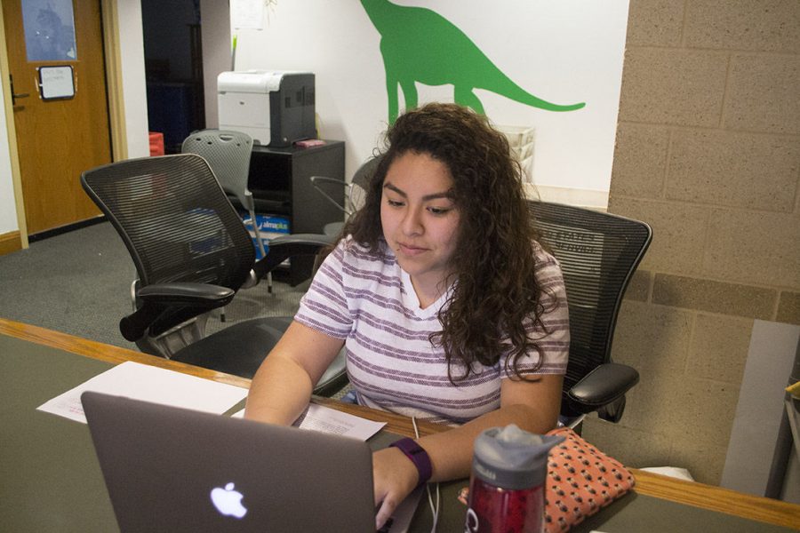 Junior Nixi Cruz-Sanchez, a desk worker, is one of many students that could be affected by the student employment policy that limits a work week to 20 hours.