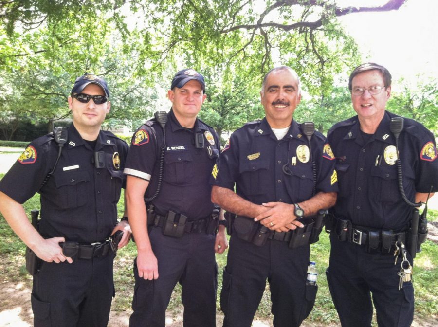 Sgt. Bobby Garcia, left, graduated from St. Edward’s in 2004 with a degree in philosophy.