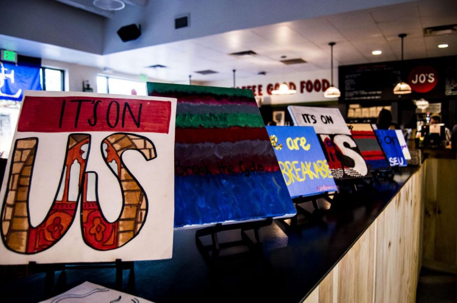 It's On Us displayed paintings and collages created by students and Woman's Empowerment.