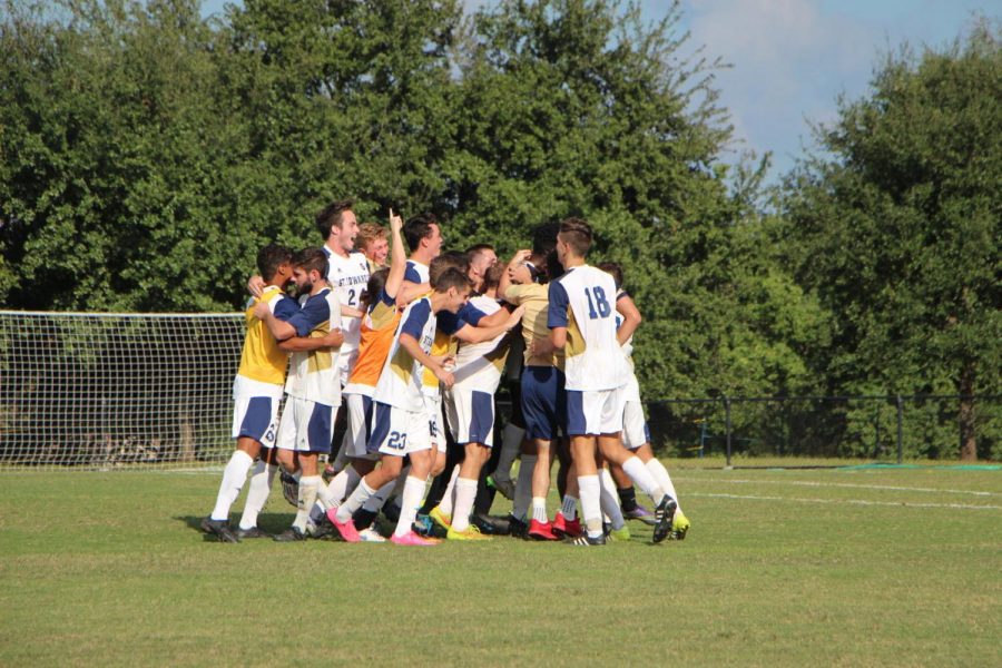 The St. Edwards mens soccer team celebrates its first NCAA Tournament victory in program history on Nov. 12.
