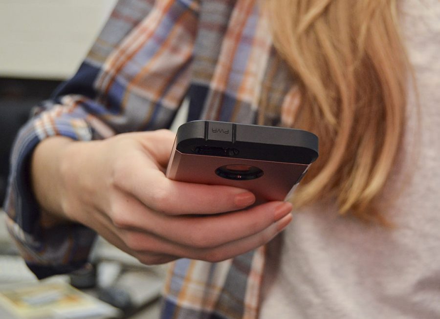 In Our View, the editorial board says people on their phones miss everything going on around them.