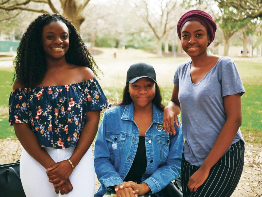 All three students are from African nations