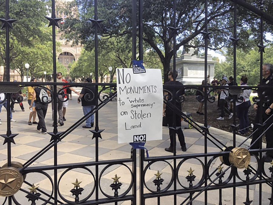 Protesters posted signs around capitol.
