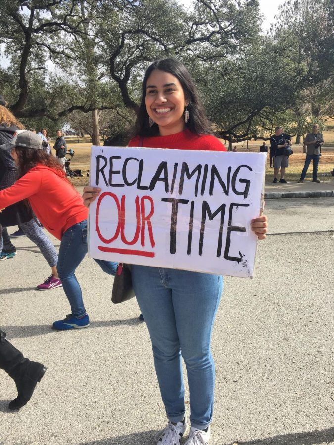 A young woman protests agains White Supremacy at the Capital.