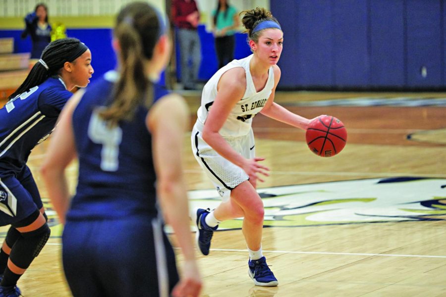 Abby Hopper dribbles the ball to set a play.