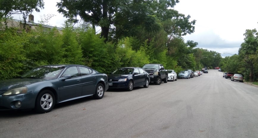 Students have opted to park on streets near the university rather than pay for a parking pass.