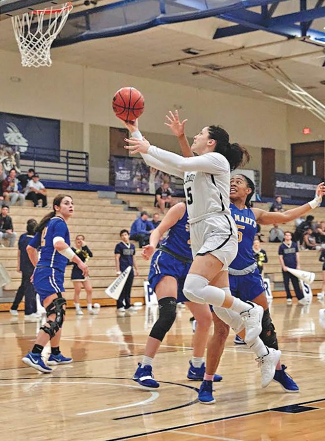 Isabel Hernandez career-high 39 points helps lead to Coach Riehls 100th career win.