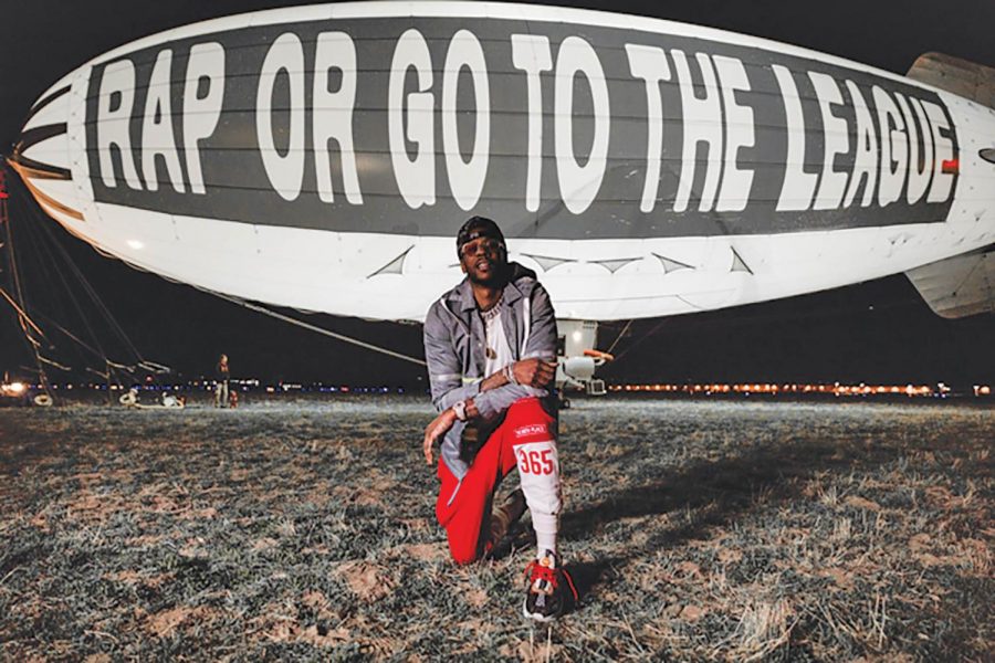 2 Chainz poses with the blimp that announced his new album in February during the NBA All-Star weekend. Metacritic has scored the album 83/100. 