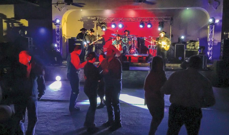 Attendees dance the night away as musician David Farias performs. 