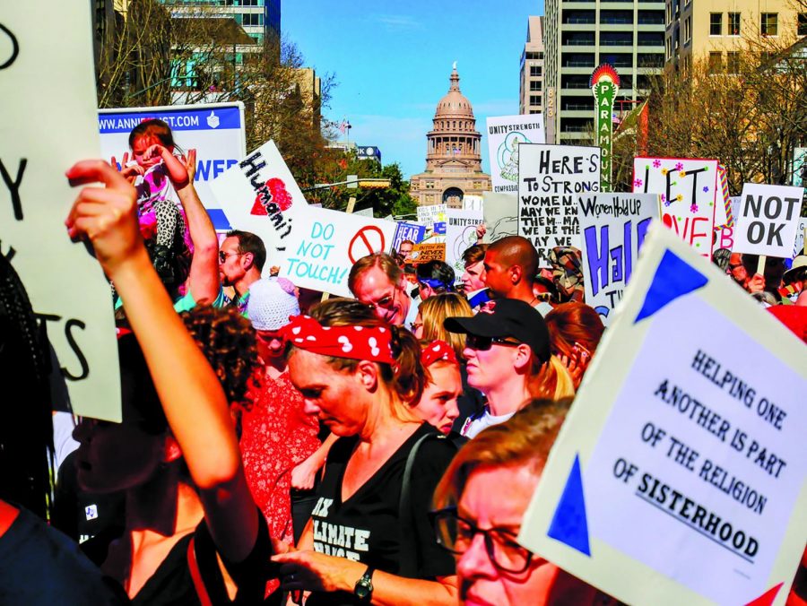 Austinites+gathered+for+the+Womens+March+back+in+2017.+The+Womens+March+dates+back+to+1908+and+takes+place+in+multiple+cities.