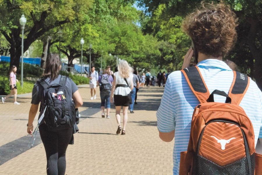 Students make their way to class on UT’s crowded campus.