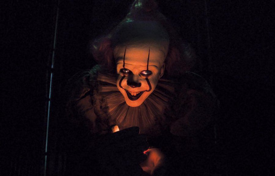 Pennywise+the+Clown+is+portrayed+by+Bill+Skarsg%C3%A5rd+in+both+IT+movies.+IT+Chapter+Two+premiered+in+theaters+on+Sept.+6