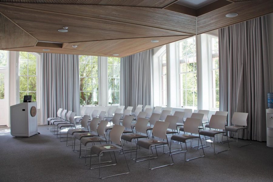 The Welcome Center includes a lounge area with natural lighting and a presentation room where students can attend information sessions about university programs and degree options.