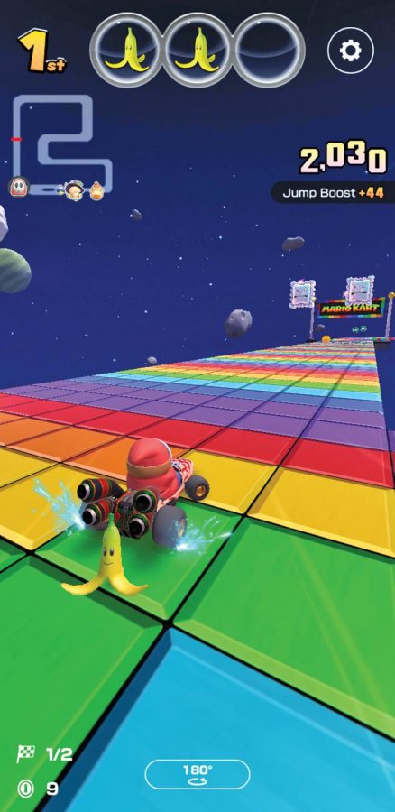 Shy Guy races to the finish line on Rainbow Road SNES on the new nintendo mobile game. 