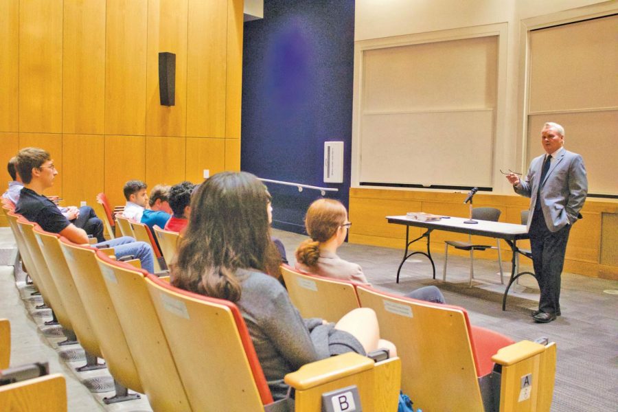 Students attend the discussion in Carter Auditorium on whether Jesus was a socialist or not.