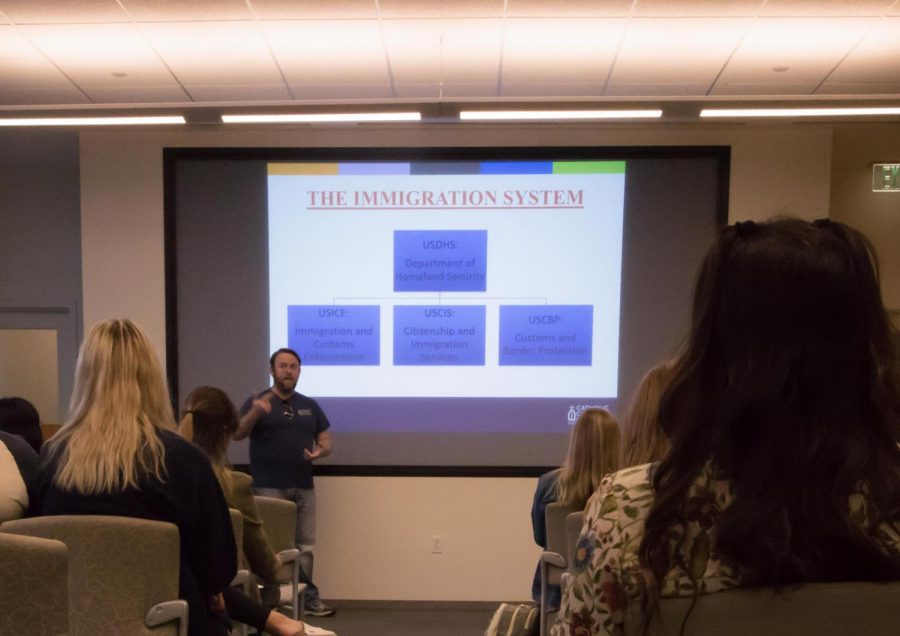 Justin Estep explains immigration system to audience members. The panel was part of events organized by Monarchs on the Hilltop for their Undocuweek.