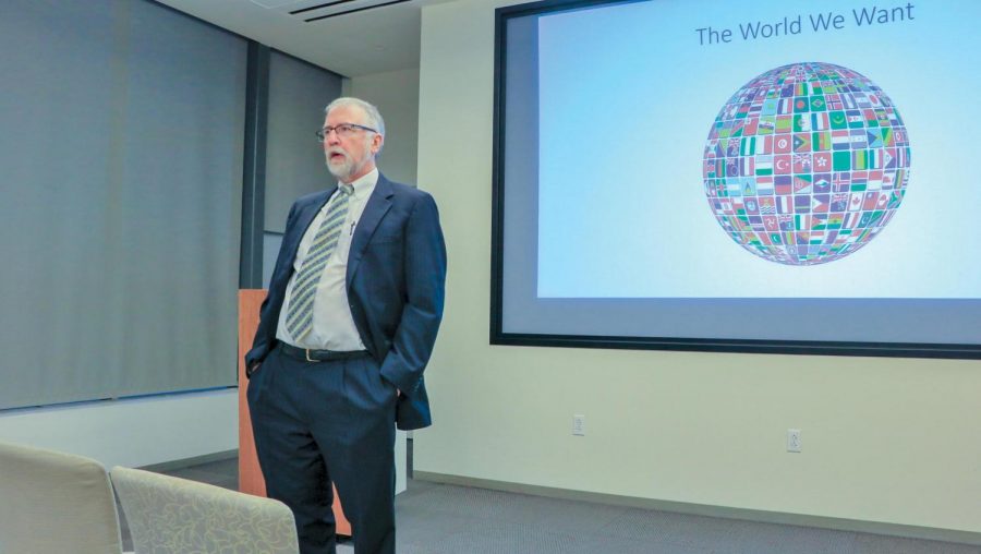 Paul Allen Miller speaks to students in Fleck Hall about globalization within universities. Miller has a Ph.D. in comparative literature and a master’s degree in classics from The University of Texas.