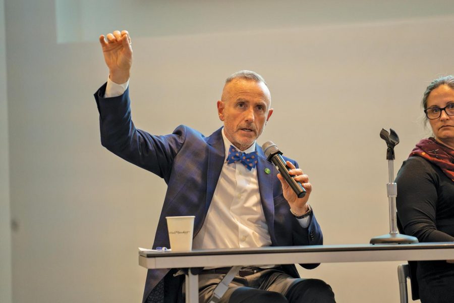 Dr. Robert Buchanan speaks to students in Jones Auditorium during a pnael discussion. Buchanan works with advising the Vatican in matters regarding science and religion.