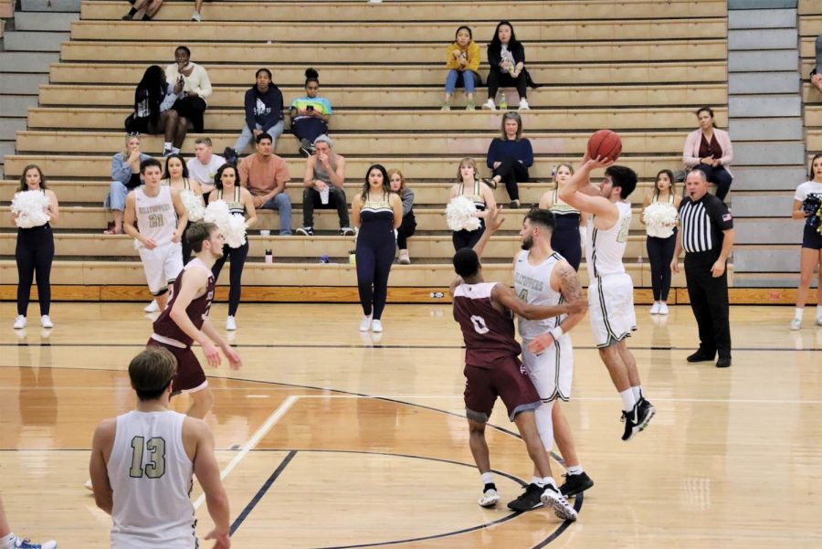 Junior guard Ryan Garza shoots a three-pointer as senior forward Dorian Lopez sets a screen. Garza looks forward to reassuming his role as sixth-man for the 2019 Heartland Conference Champions.