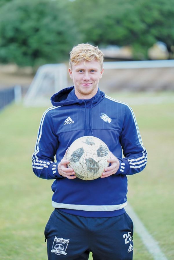 Matthew Parker is one of the captains of the soccer team. His physical play has been crucial for the team's winning conference record. 