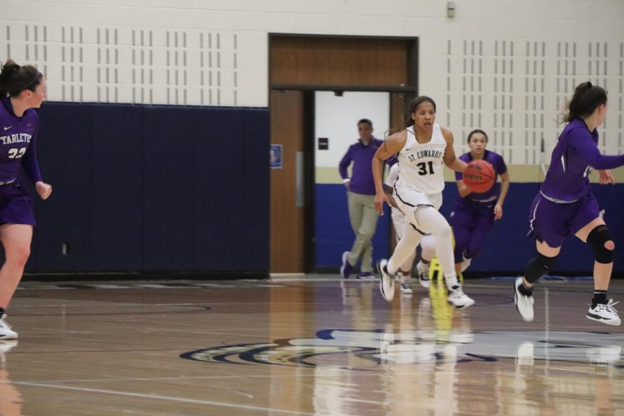 Senior forward Deijah Blanks dribbles the ball down court against Tarleton University on Jan. 30. Blanks finished with a game-high 22 points along with eight rebounds.