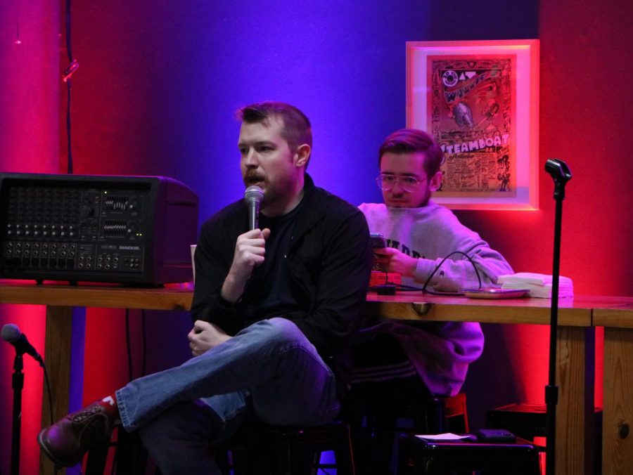Tom Francis delivers jokes to the gathered audience at Jo's. Jo's is known for putting on events such as open mic nights and art slams.