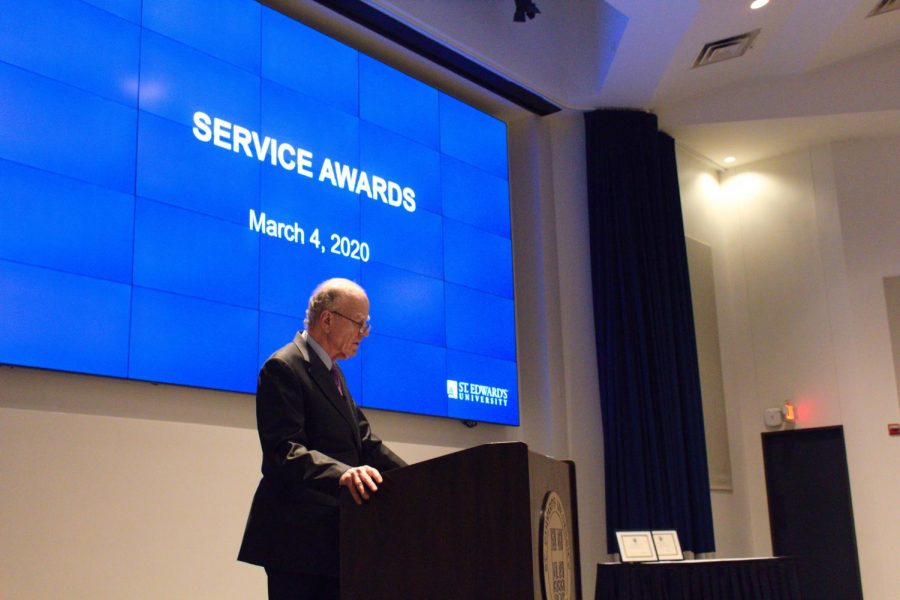During the annual Presidents Meeting, the university president addresses the St. Edwards faculty and staff about the state of the campus. The meeting also included service awards given to faculty and staff.